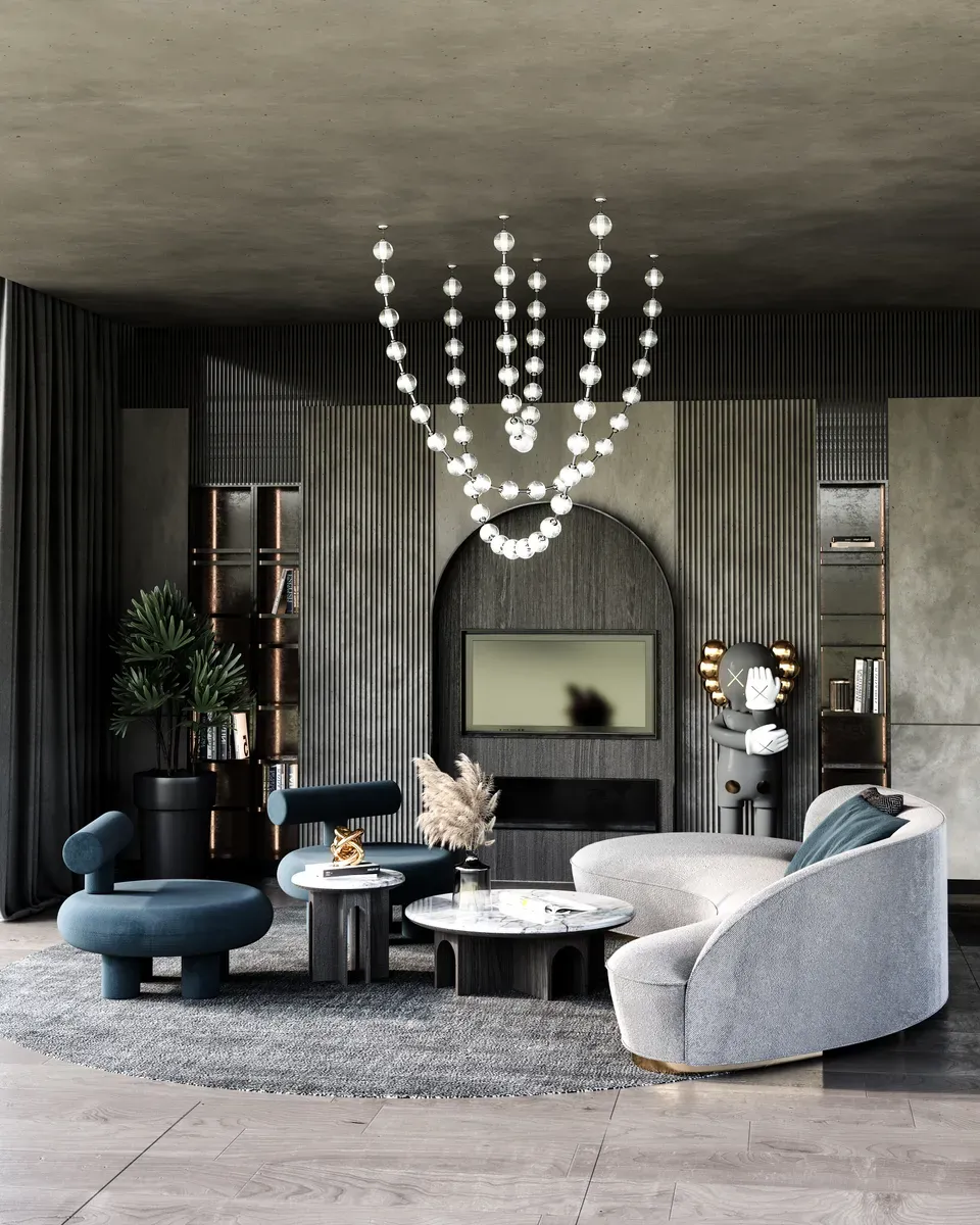 Sala de estar contemporánea con lámpara de esferas en cascada y sofá curvo
